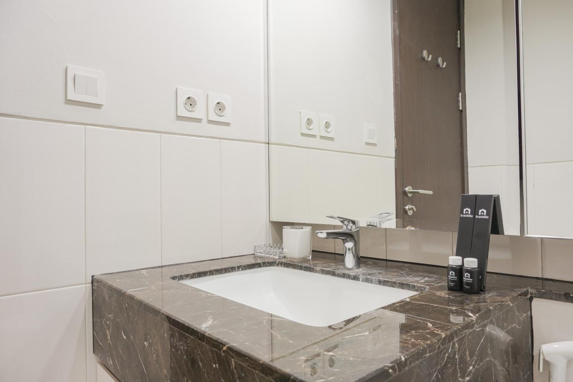 Apartemen Cozy At Nine By Travelio Jakarta